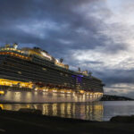 8.0 - In my opinion, the blue hour light and stormy sky create strong impact. The placement of the ship in the frame is a unique and creative approach. However, this placement also leads my eye out of the frame. To me, the composition is too heavy on the left.