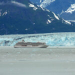 5.0 - Looks like cloudy day in Antarctica; Mtns and iceberg look vast; a bit flat.