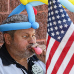 6.5 - The comical expression made me wonder wether the balloon would blow up first or his eyes would pop out of his head.