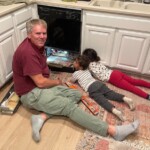 6.5 - This image brought a smile to my face. I think it would be stronger if one of the children would be handing Grandpa a tool, like a screwdriver for instance.
