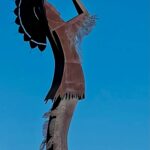 6.0 - This photo has good color, exposure, and composition. There is no interest in the sky. Though the image is technically well done, in my opinion, daylight photos of statues are not very interesting or competitive.