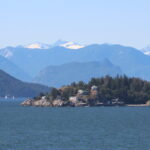 5.8 - This photo has nice scenic elements, but the apparent mid-day light and haze work against the composition. This is not a very competitive photo simply because of poor lighting.