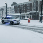 7.26 - The identification on the door and the lights of the car really tell the story about the unexpected weather. There is a lot of information about what might be happening in this image. I would imagine that this much snow is really unusual for New Orleans. I like that you have a lot of room for the car to move into in the composition. A heavier snowfall could have added to the story.