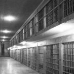 6.2 - This has dominating lead-in to a small dark door at the end. The top and bottom rows of jail cells provide lots of interesting texture and detail. However, the long row of cells lead only to a dark door on the left edge, making for an awkward composition, and the lights are a little overexposed.