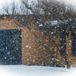 4.62 - This really does show what you were getting from the winter storm. If you could have used a slower shutter speed, it would have given you some action with the falling snow. It is hard to find something to really capture the viewer’s eye. Using the white vignette does help keep it in the frame. When you use a vignette like this, it would probably be better to blend it into the image and not make it strong enough to be noticed by the viewer unless they really had looked for it.