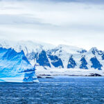 7.92 - I like the way the mountain range is positioned in the frame. This is perfect for the panoramic image. The little white iceberg keeps the viewer’s eye in the frame. You probably didn’t have much choice with it’s placement but it could have been a little further into the image.