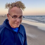 1st - 8.0 - I appreciate the spontaneity of the moment and the surprise of the seaweed toupee. The crinkly face and expressive eyes add to the humor.